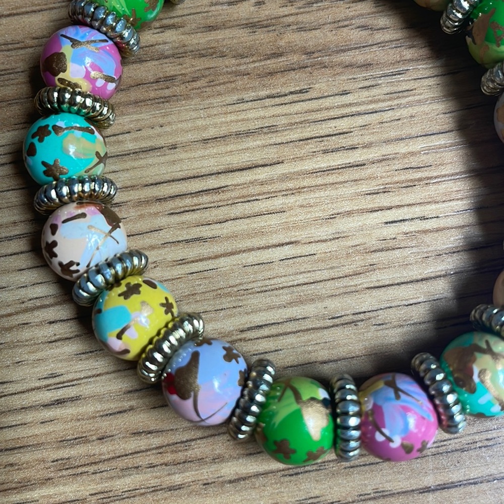 Hand painted Angela Moore stretch bracelet with pretty multi colored beads